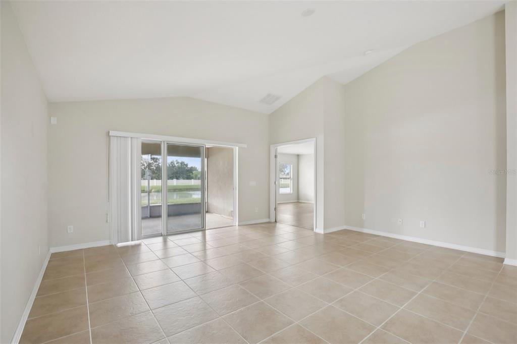 106 Star Shell Drive Apollo Beach, FL 33572 - Photo 8 of 33 a view of an empty room with a window
