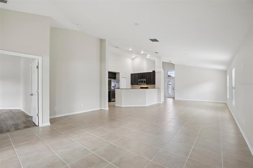 106 Star Shell Drive Apollo Beach, FL 33572 - Photo 9 of 33 a view of a kitchen with a sink and a stove top oven
