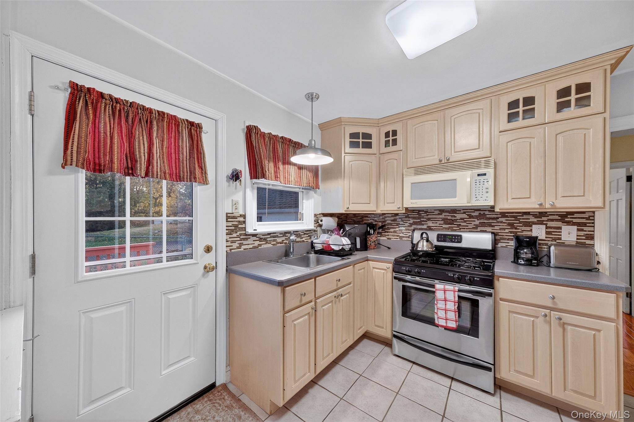 14 Ruppert Road Poughkeepsie, NY 12603 - Photo 14 of 35 a kitchen with stainless steel appliances granite countertop a stove a sink and a refrigerator