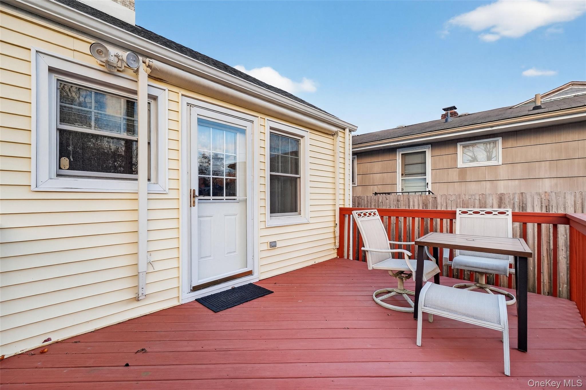 14 Ruppert Road Poughkeepsie, NY 12603 - Photo 18 of 35 a balcony with wooden floor and furniture