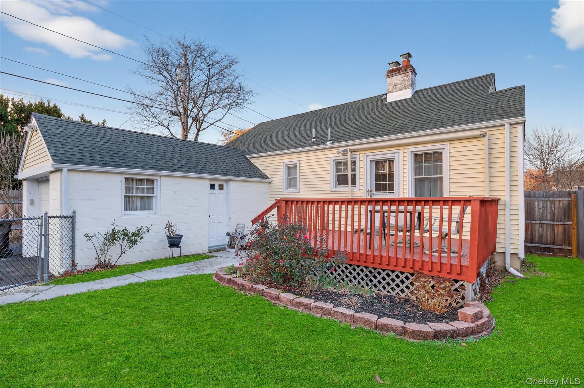 14 Ruppert Road Poughkeepsie, NY 12603 - Photo 20 of 35 a front view of a house with a garden and yard