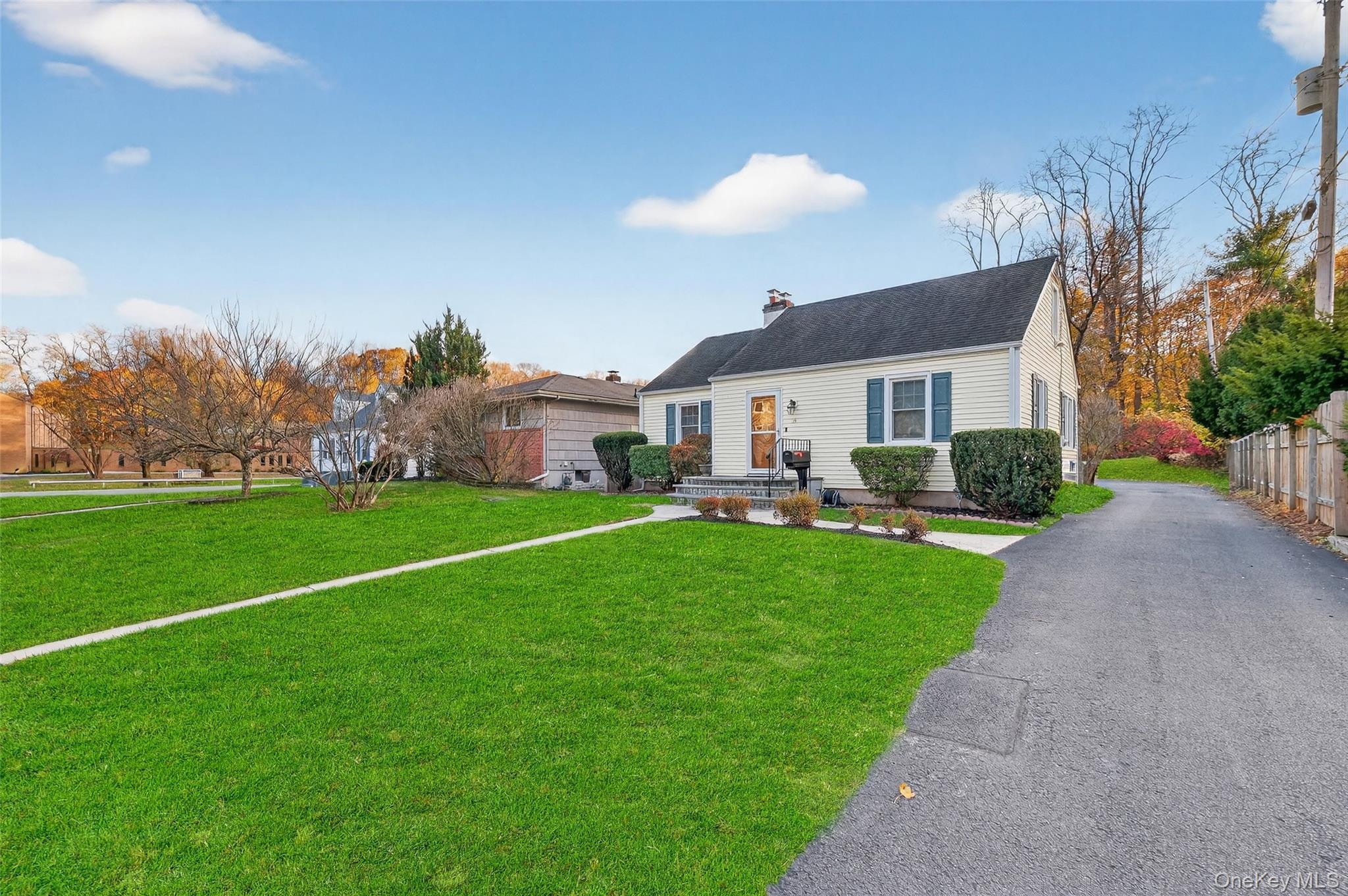 14 Ruppert Road Poughkeepsie, NY 12603 - Photo 2 of 35 a front view of a house with a garden and plants