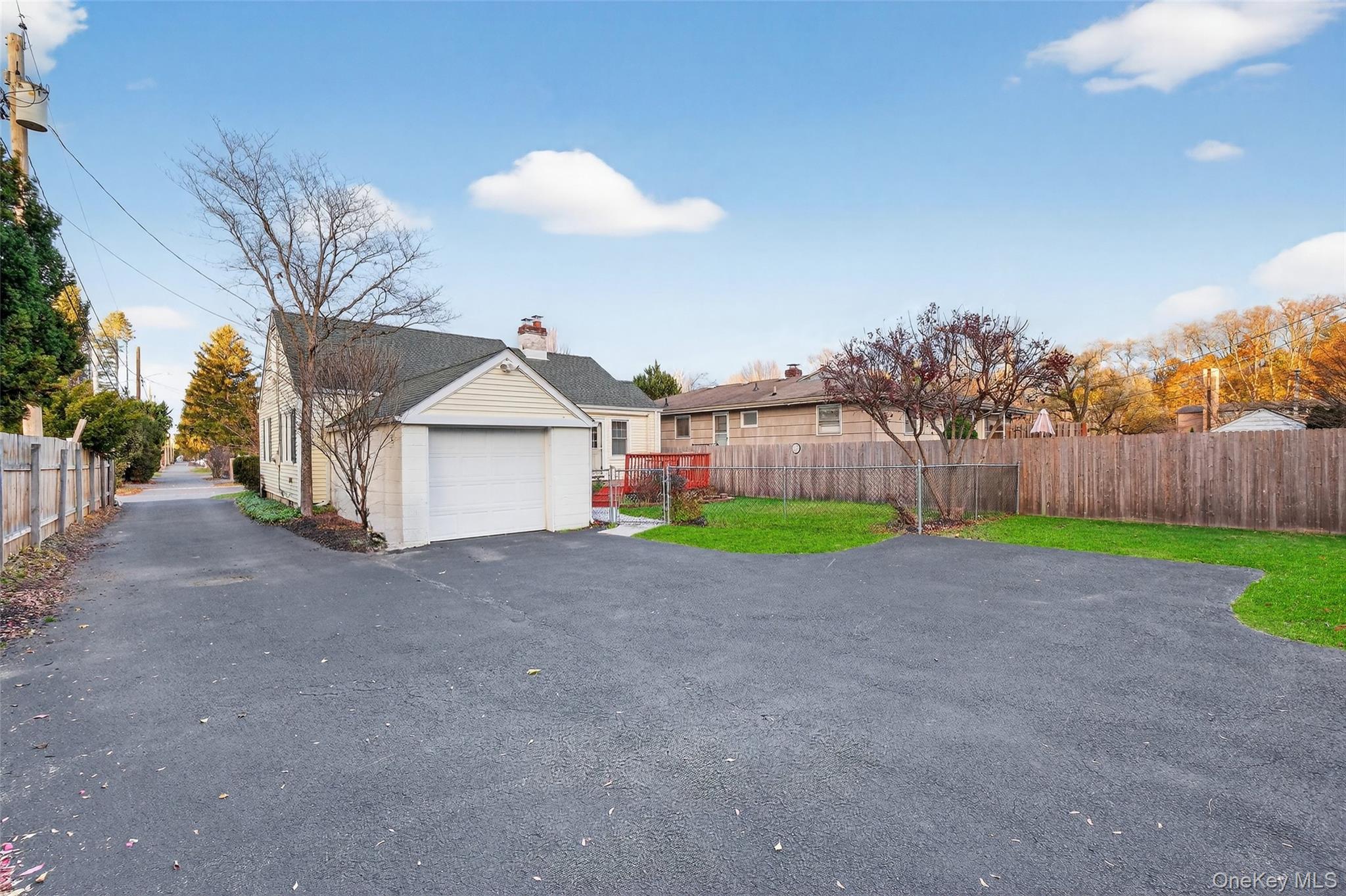 14 Ruppert Road Poughkeepsie, NY 12603 - Photo 23 of 35 a view of a house with a yard and garage
