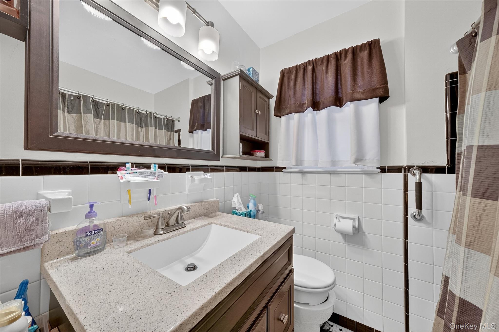 14 Ruppert Road Poughkeepsie, NY 12603 - Photo 25 of 35 a bathroom with a sink a toilet and shower