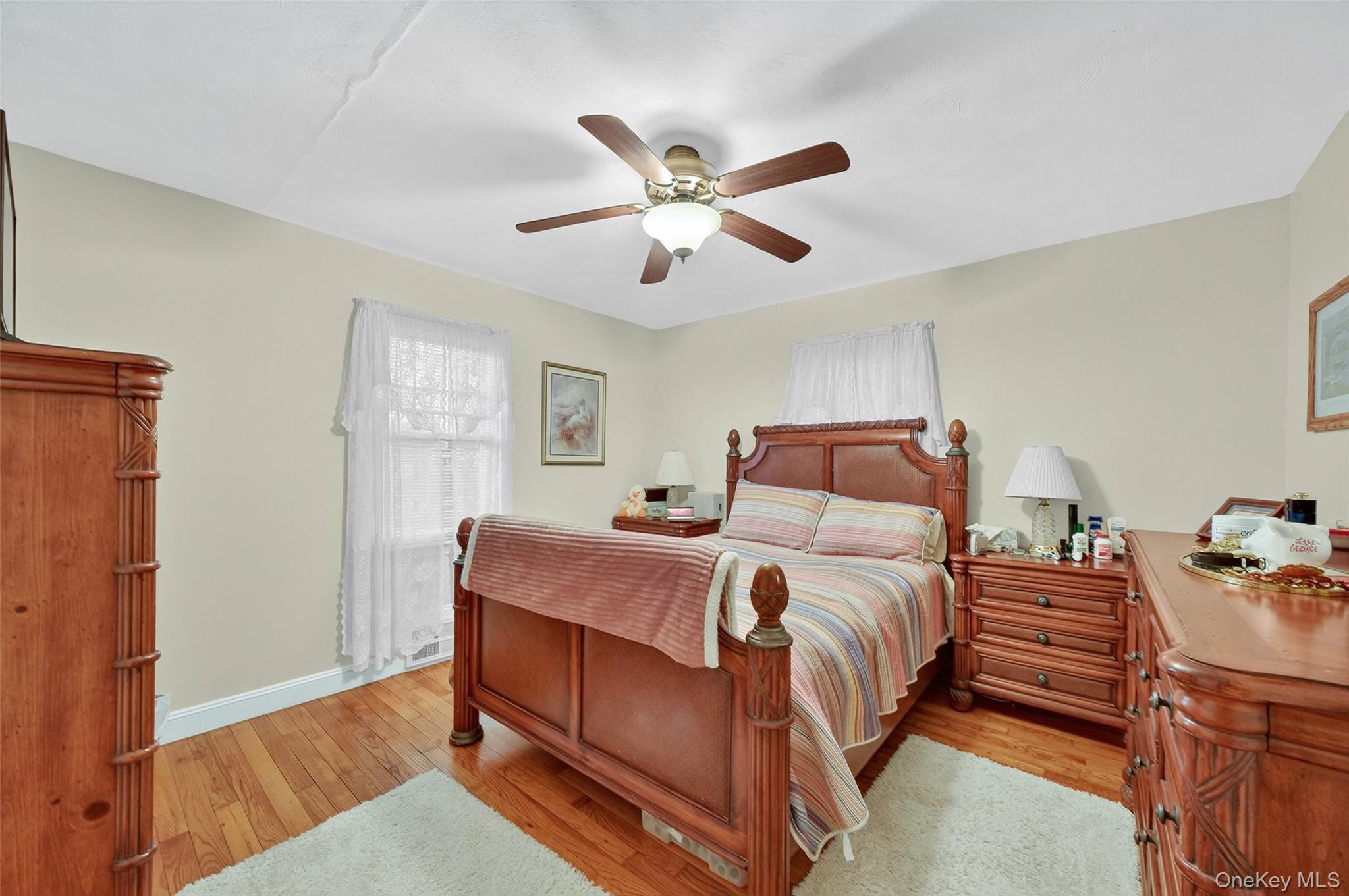 14 Ruppert Road Poughkeepsie, NY 12603 - Photo 26 of 35 a bedroom with a bed and wooden floor
