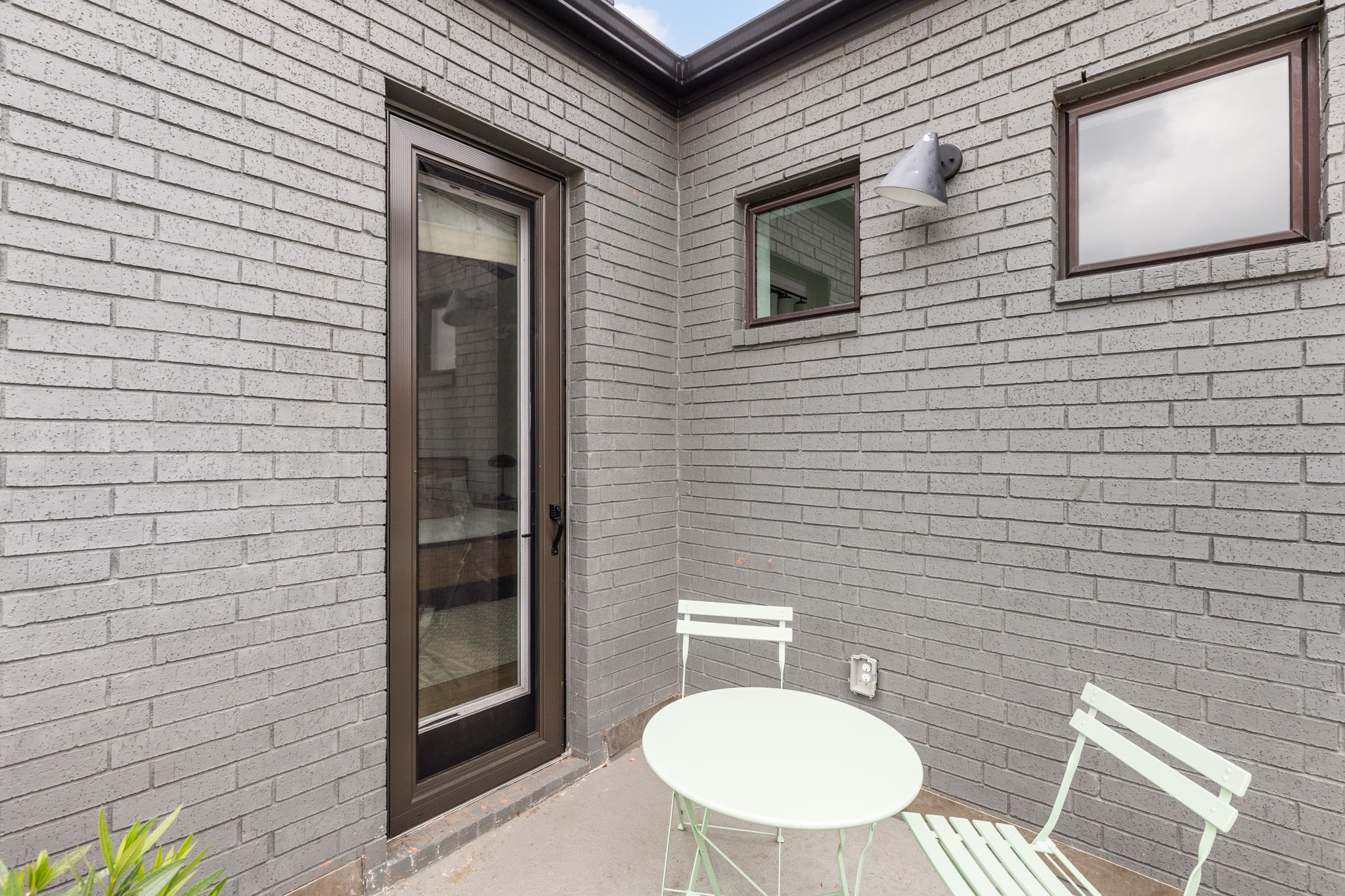 4710 Eberly Street Austin, TX 78723 - Photo 25 of 36 a backyard of a house with table and chairs