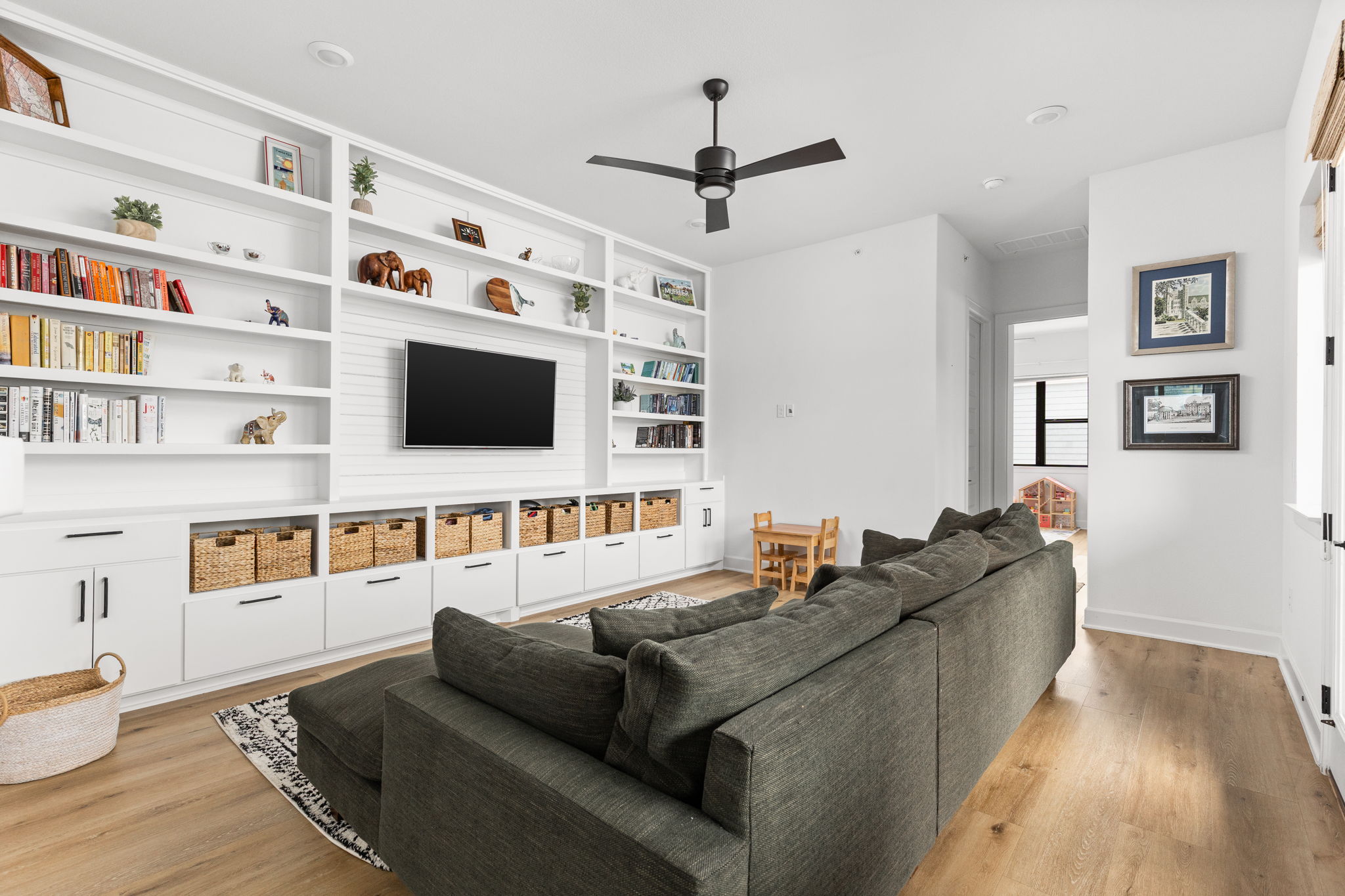 4710 Eberly Street Austin, TX 78723 - Photo 26 of 36 a living room with furniture and a flat screen tv