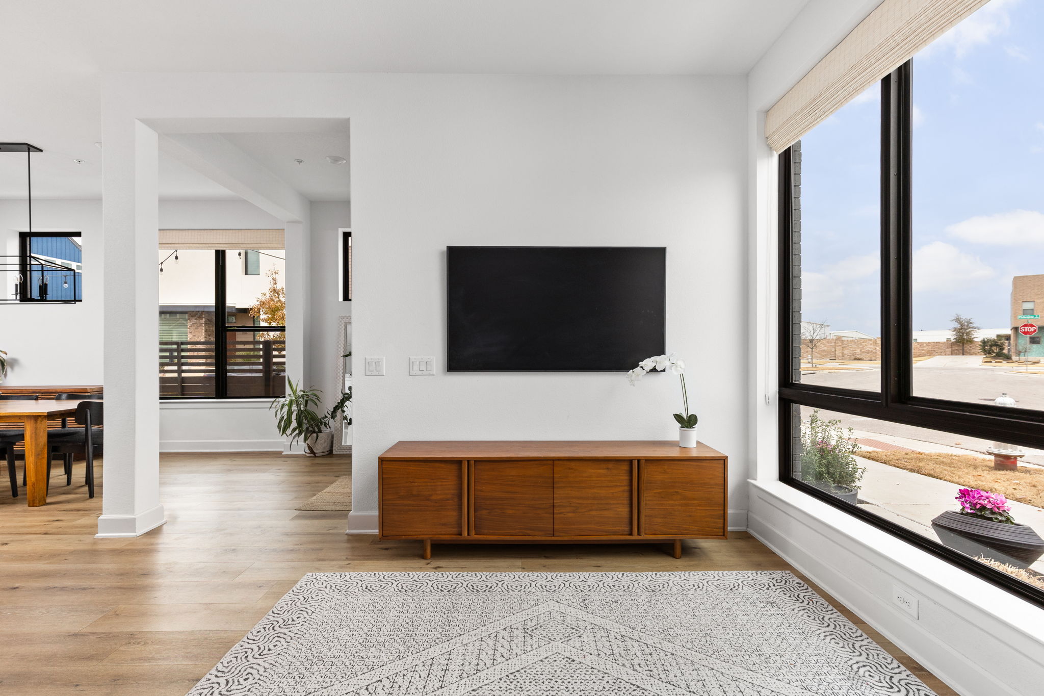 4710 Eberly Street Austin, TX 78723 - Photo 6 of 36 a living room with a flat screen tv and a couch