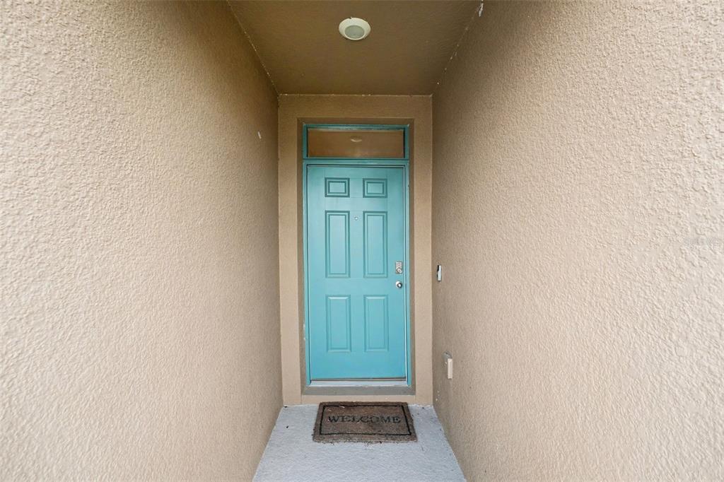 2795 Grandbury Grove Road Lakeland, FL 33811 - Photo 3 of 35 a view of a hallway with wooden floor