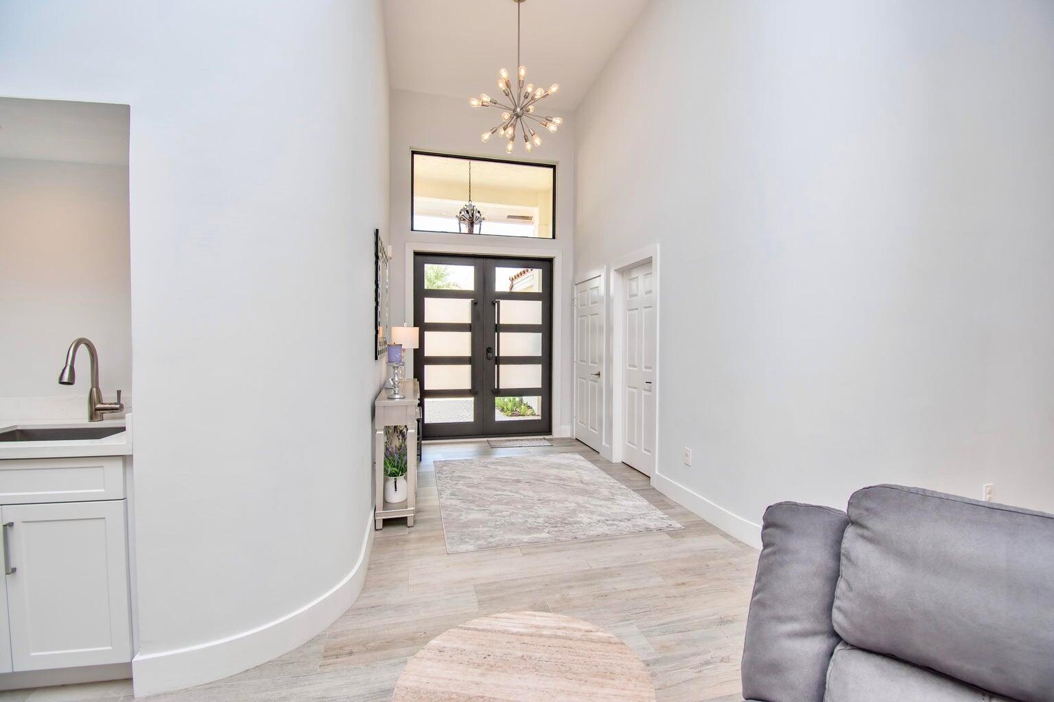 2302 Northwest 66th Drive Boca Raton, FL 33496 - Photo 12 of 53 a view of livingroom with furniture and window