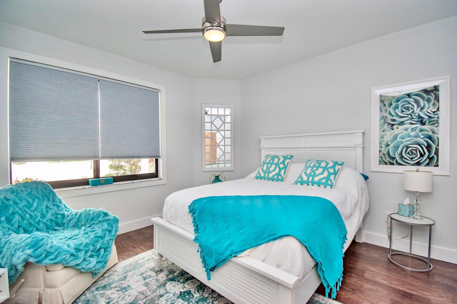 2302 Northwest 66th Drive Boca Raton, FL 33496 - Photo 34 of 53 a bedroom with a bed mirror and a window