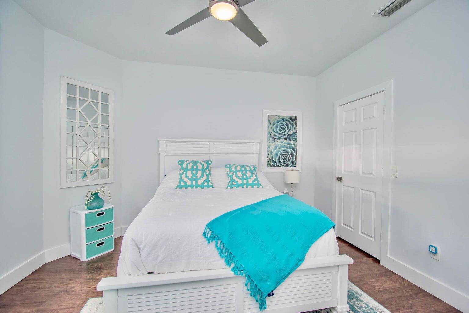 2302 Northwest 66th Drive Boca Raton, FL 33496 - Photo 35 of 53 a bedroom with a bed and a window