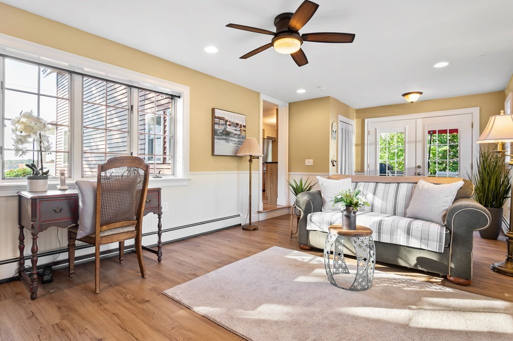 43 Birchmeadow Road Amesbury, MA 01913 - Photo 21 of 39 a living room with furniture and a large window