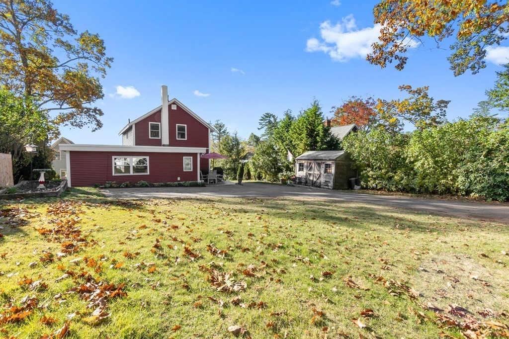 43 Birchmeadow Road Amesbury, MA 01913 - Photo 34 of 39 a front view of a house with a yard