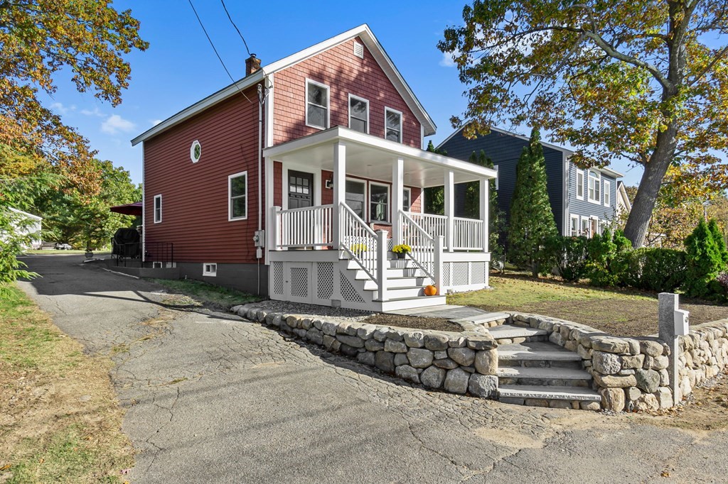 43 Birchmeadow Road Amesbury, MA 01913 - Photo 4 of 39 a front view of a house with a yard