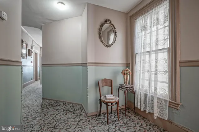 an aerial view of a house with a ocean view