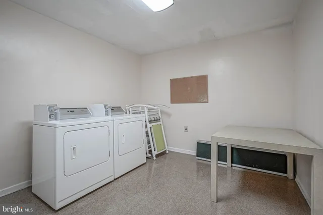 a view of a city with lawn chairs