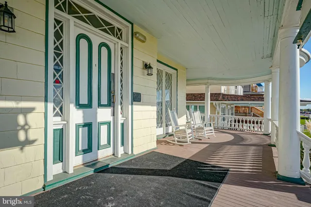 a view of a balcony with chairs