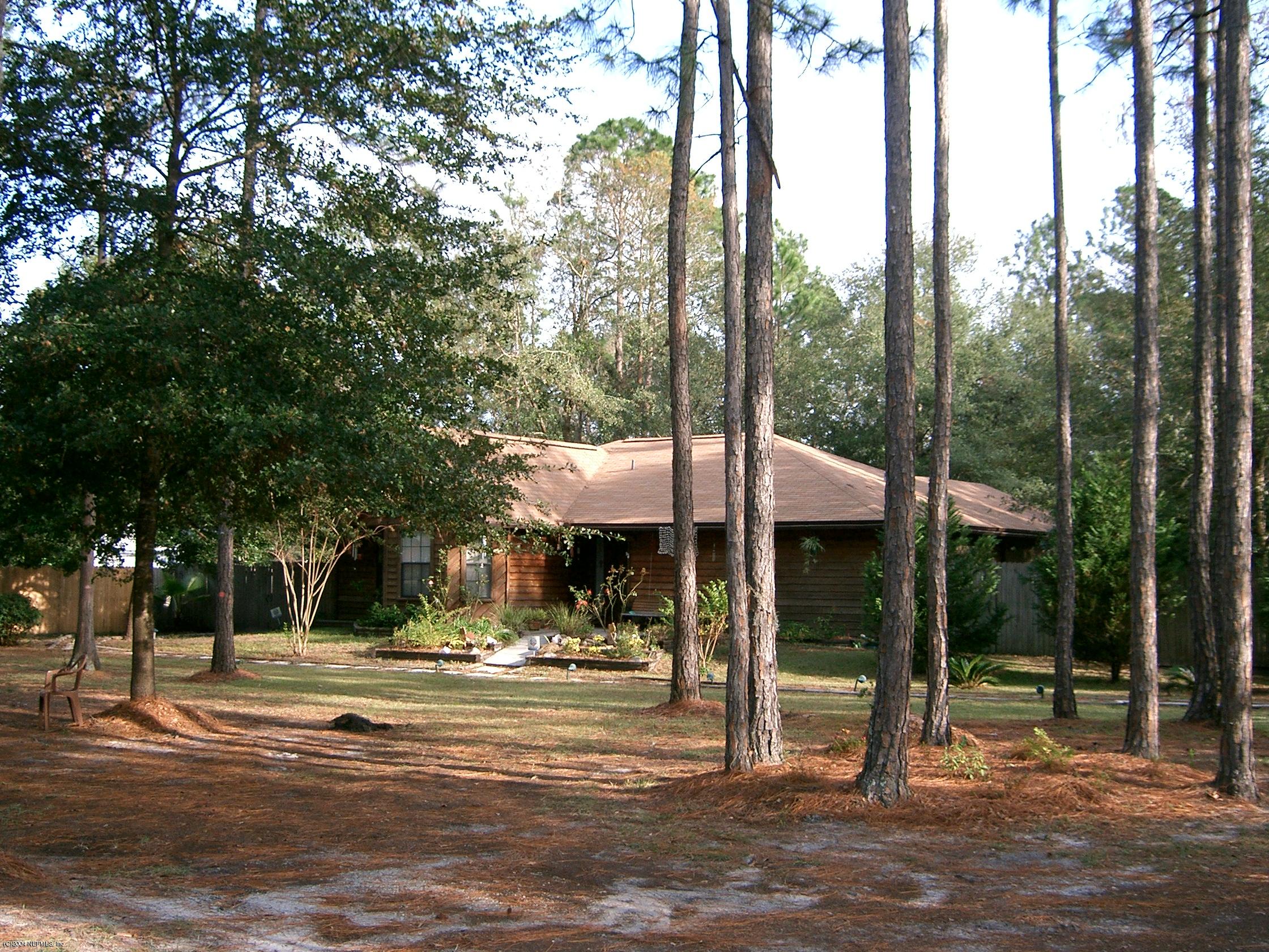 1137 Cactus Cut Road Middleburg, FL 32068 - Photo 1 of 6 a view of a park with tree s