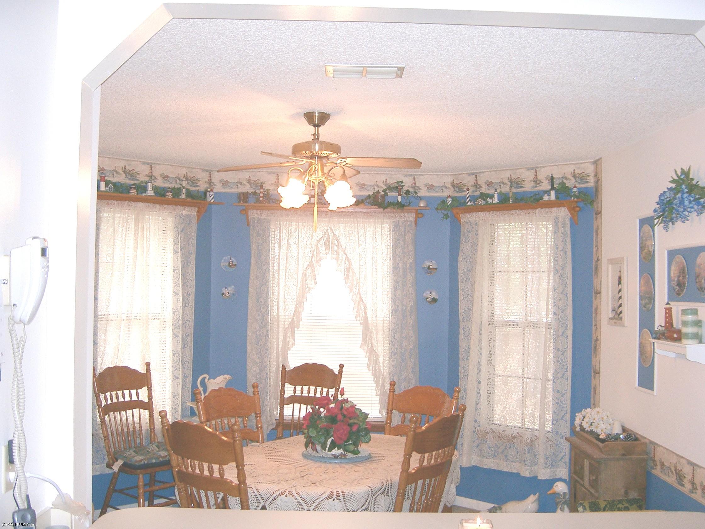 1137 Cactus Cut Road Middleburg, FL 32068 - Photo 3 of 6 a view of a livingroom with furniture and window
