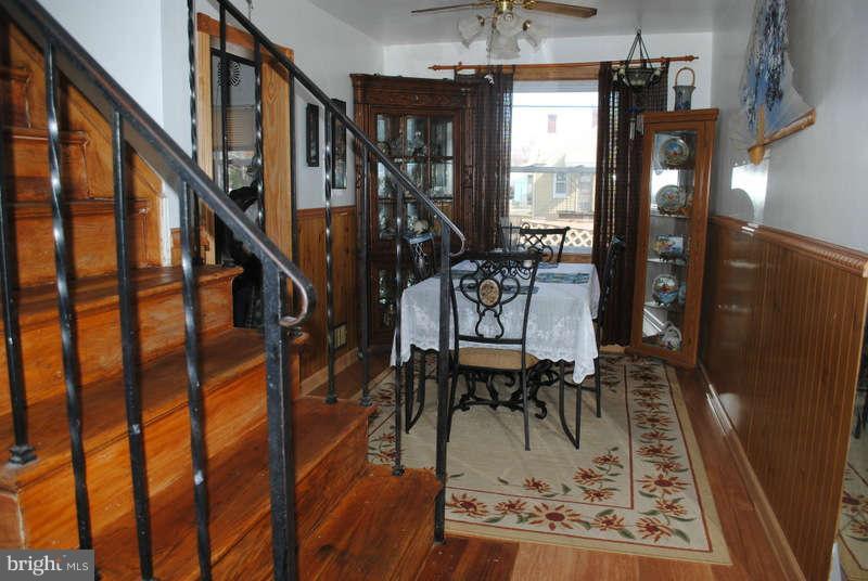 8174 Kavanagh Road Baltimore, MD 21222 - Photo 5 of 19 a view of living room with furniture and a rug