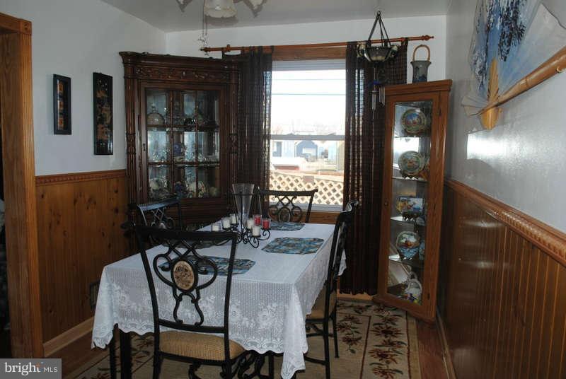 8174 Kavanagh Road Baltimore, MD 21222 - Photo 7 of 19 a view of a dining room with furniture and window