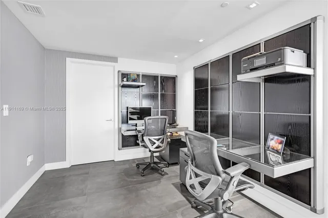 a kitchen with a sink cabinets and window