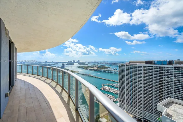 a balcony with view of lake