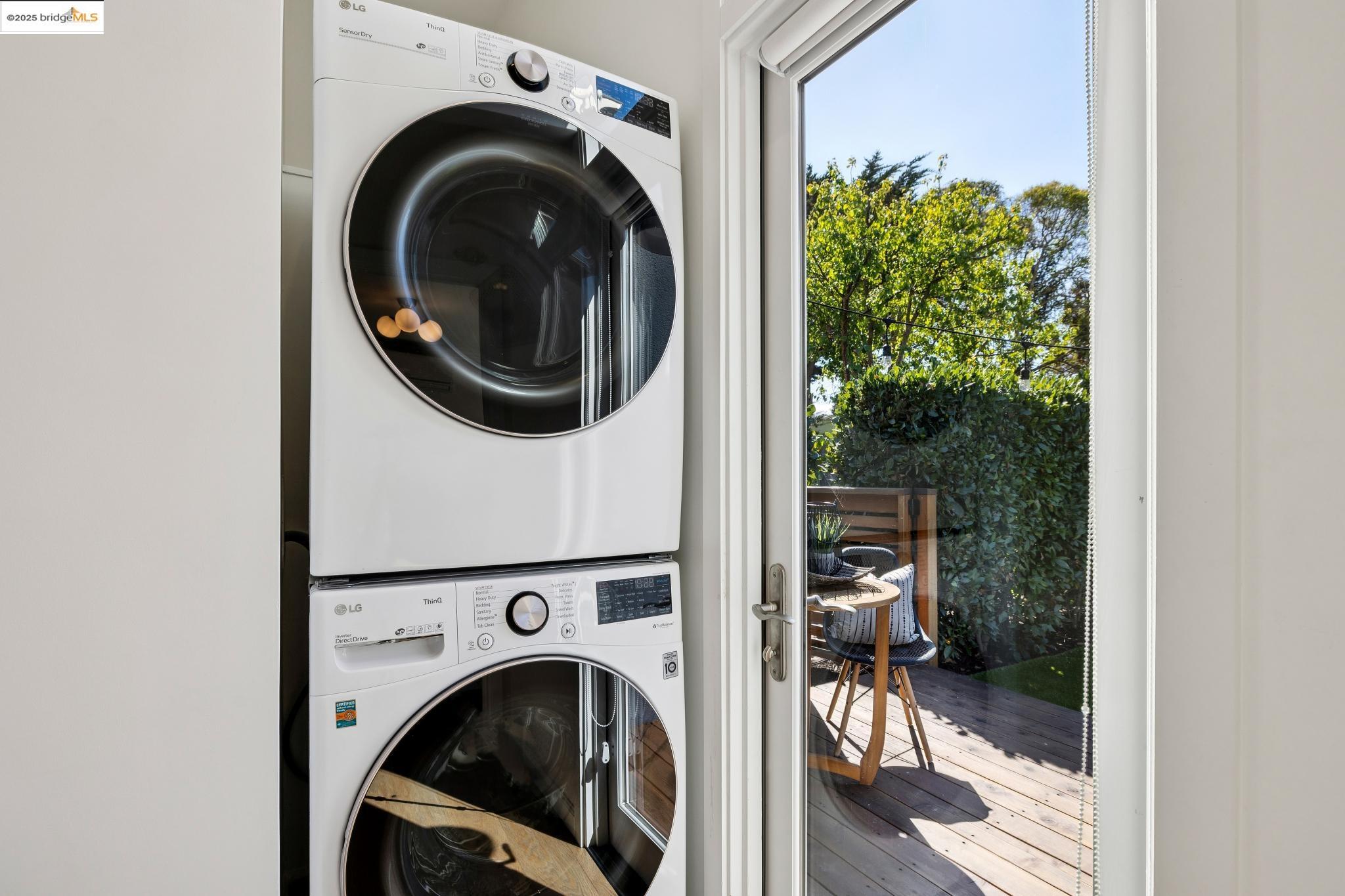 1642 Tenth Street Berkeley, CA 94710 - Photo 19 of 51 a view of a hallway with washer and dryer