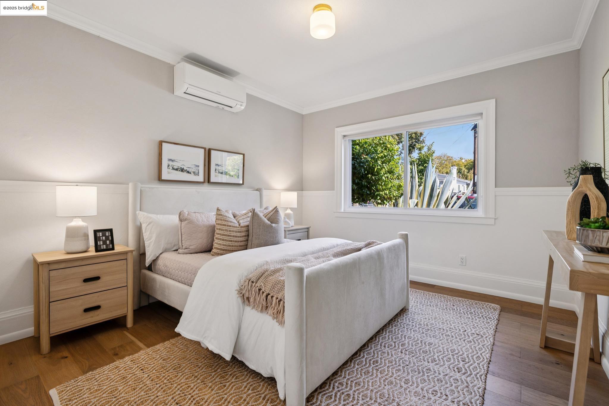 1642 Tenth Street Berkeley, CA 94710 - Photo 20 of 51 a bedroom with a bed and a window