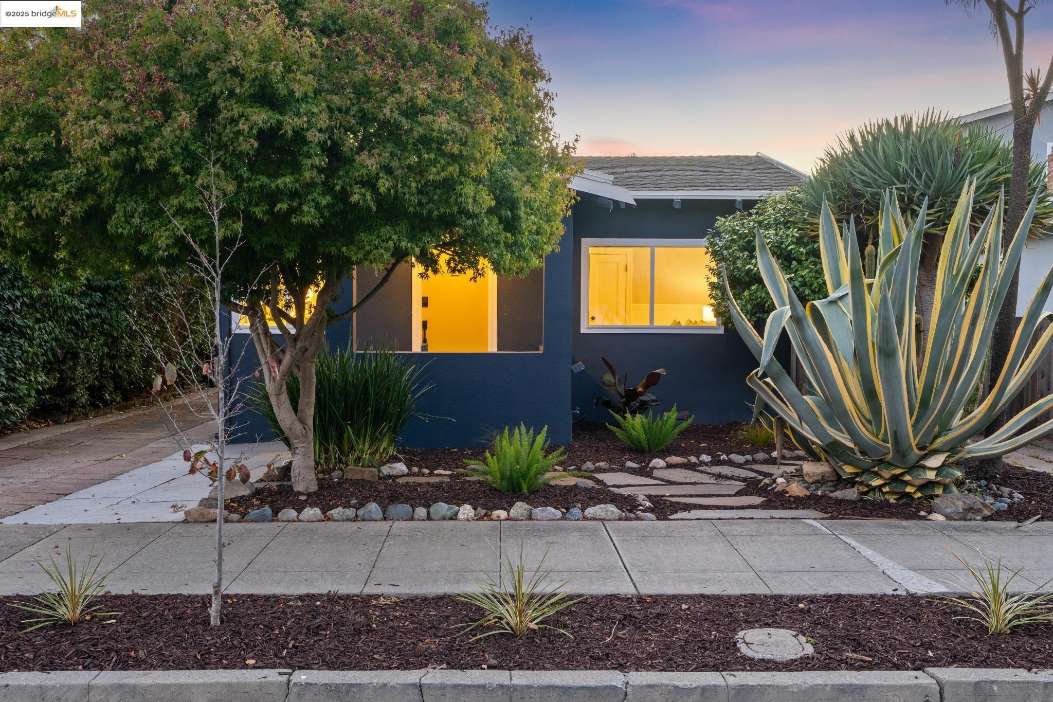 1642 Tenth Street Berkeley, CA 94710 - Photo 2 of 51 a view of a front door and trees