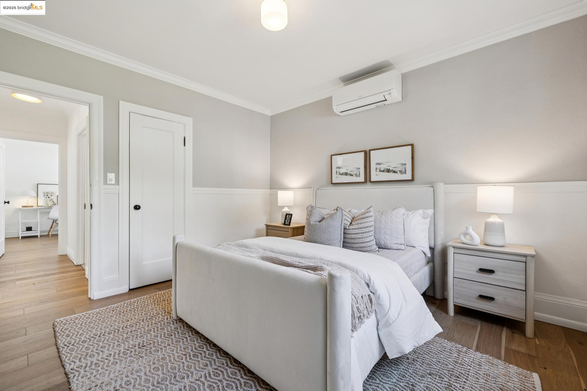 1642 Tenth Street Berkeley, CA 94710 - Photo 21 of 51 a room with a bed and a couch