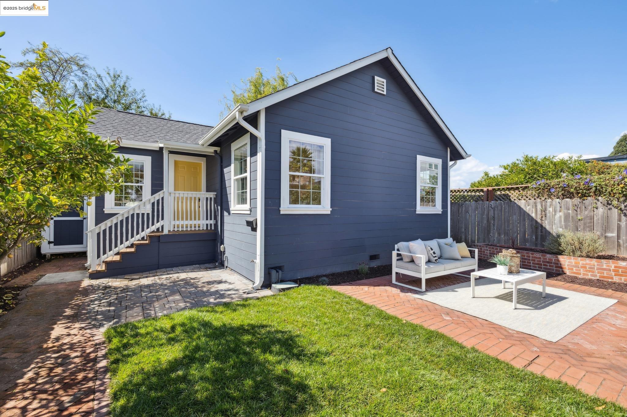 1642 Tenth Street Berkeley, CA 94710 - Photo 27 of 51 a view of backyard of house with outdoor seating