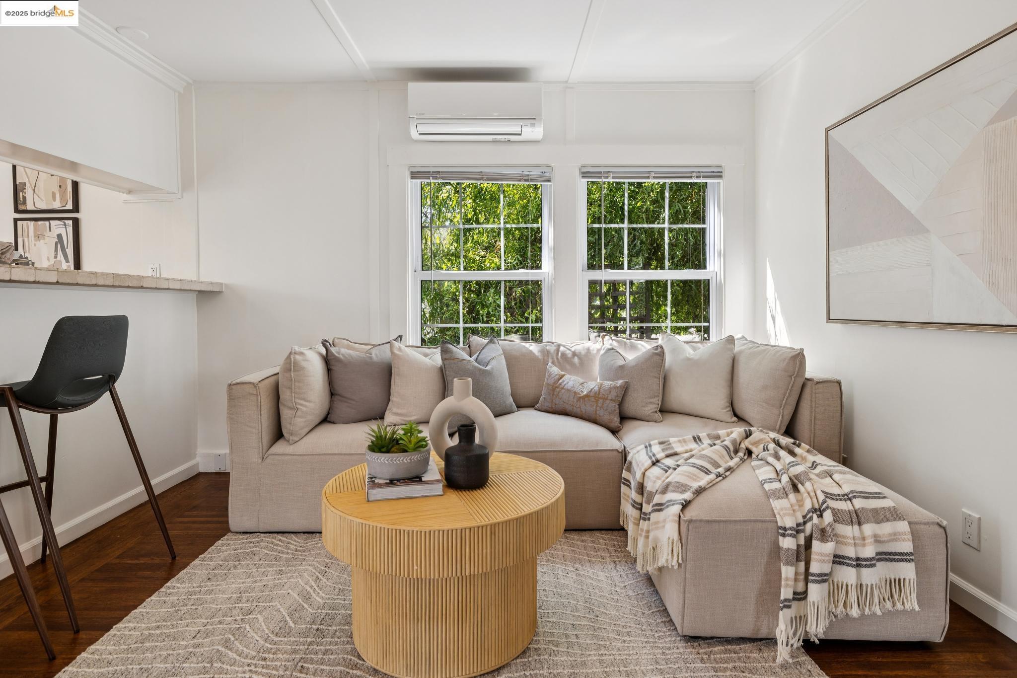 1642 Tenth Street Berkeley, CA 94710 - Photo 29 of 51 a living room with furniture and a window