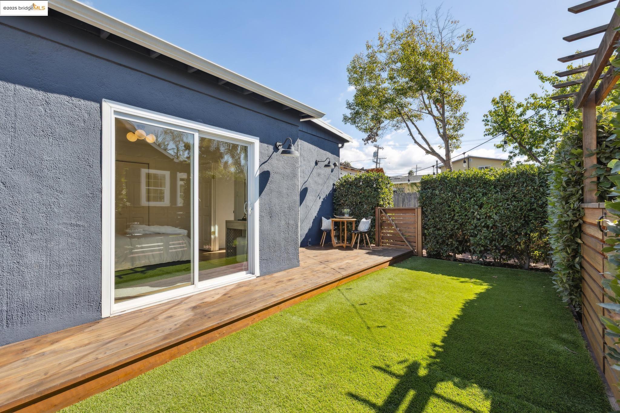 1642 Tenth Street Berkeley, CA 94710 - Photo 42 of 51 a view of a house with a backyard