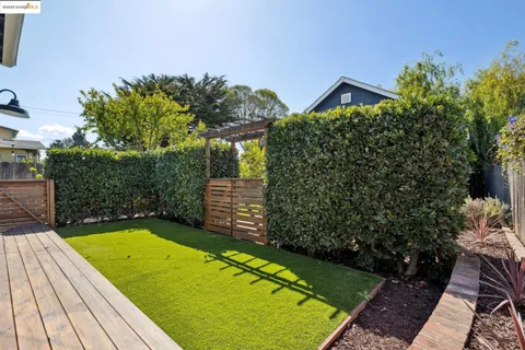 a view of swimming pool with a backyard
