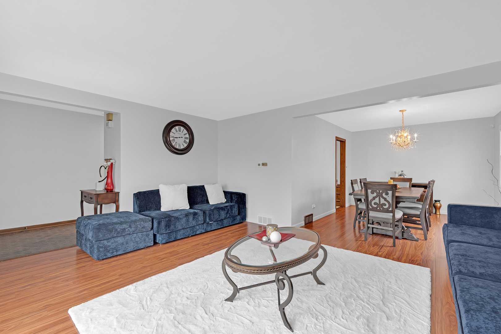 11020 Raleigh Street Westchester, IL 60154 - Photo 5 of 27 a living room with furniture and wooden floor