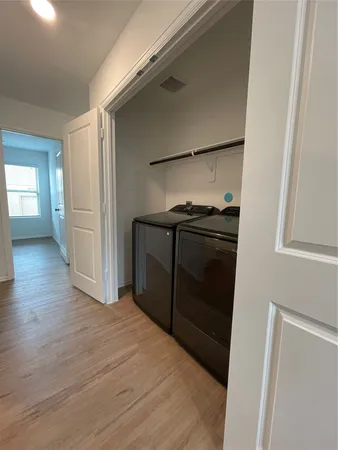 a bathroom with a bathtub and toilet