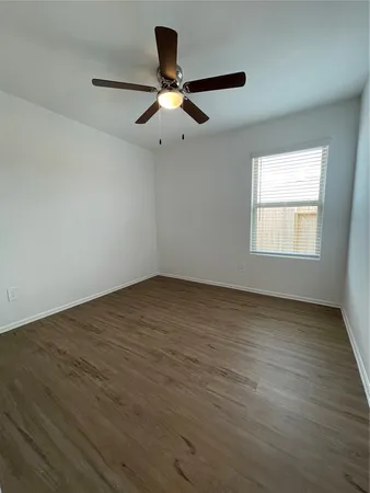 a large kitchen with stainless steel appliances granite countertop a stove a sink and a refrigerator