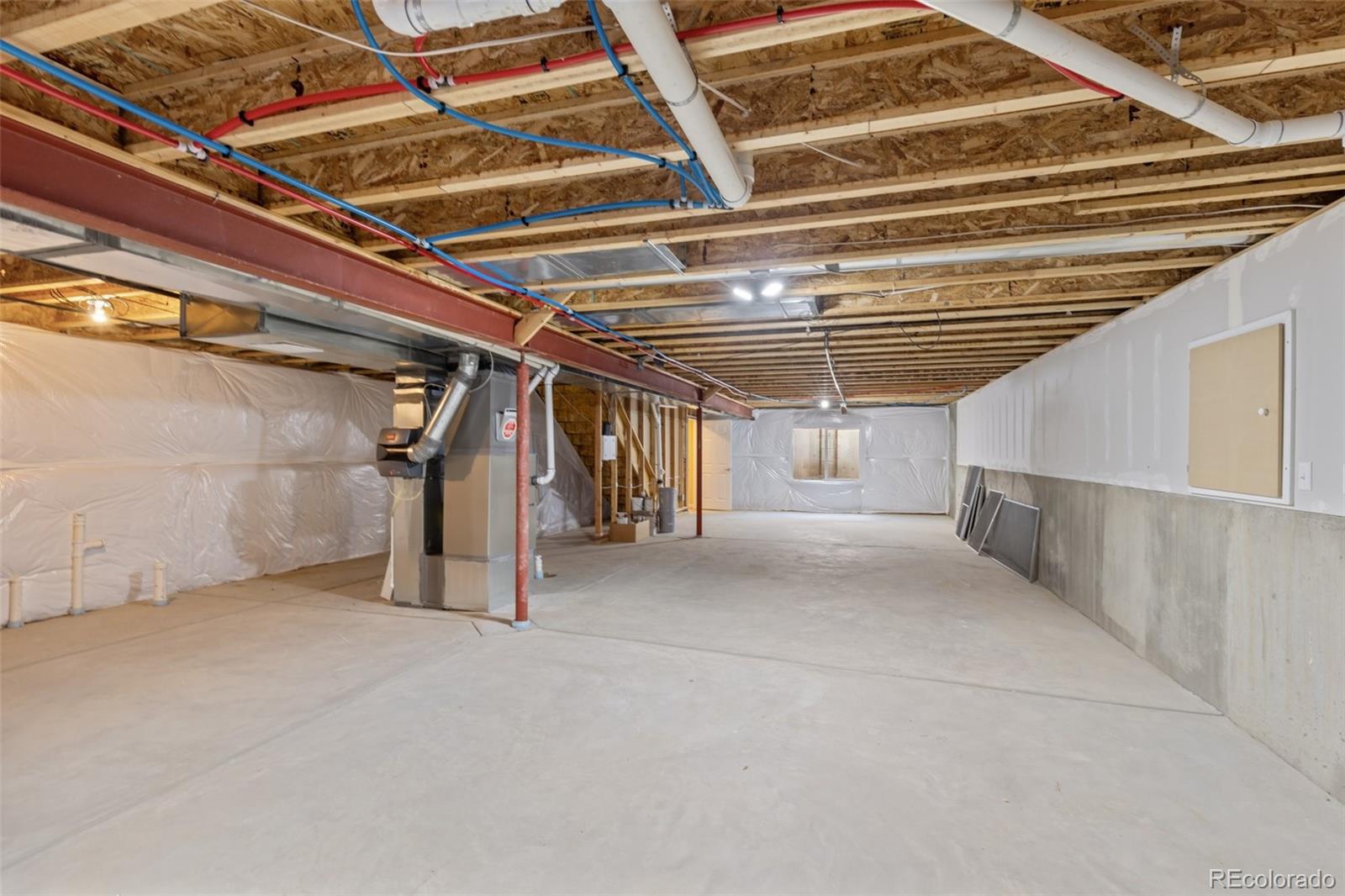 15965 Redcloud Way Broomfield, CO 80023 - Photo 28 of 49 a view of under construction room and staircase