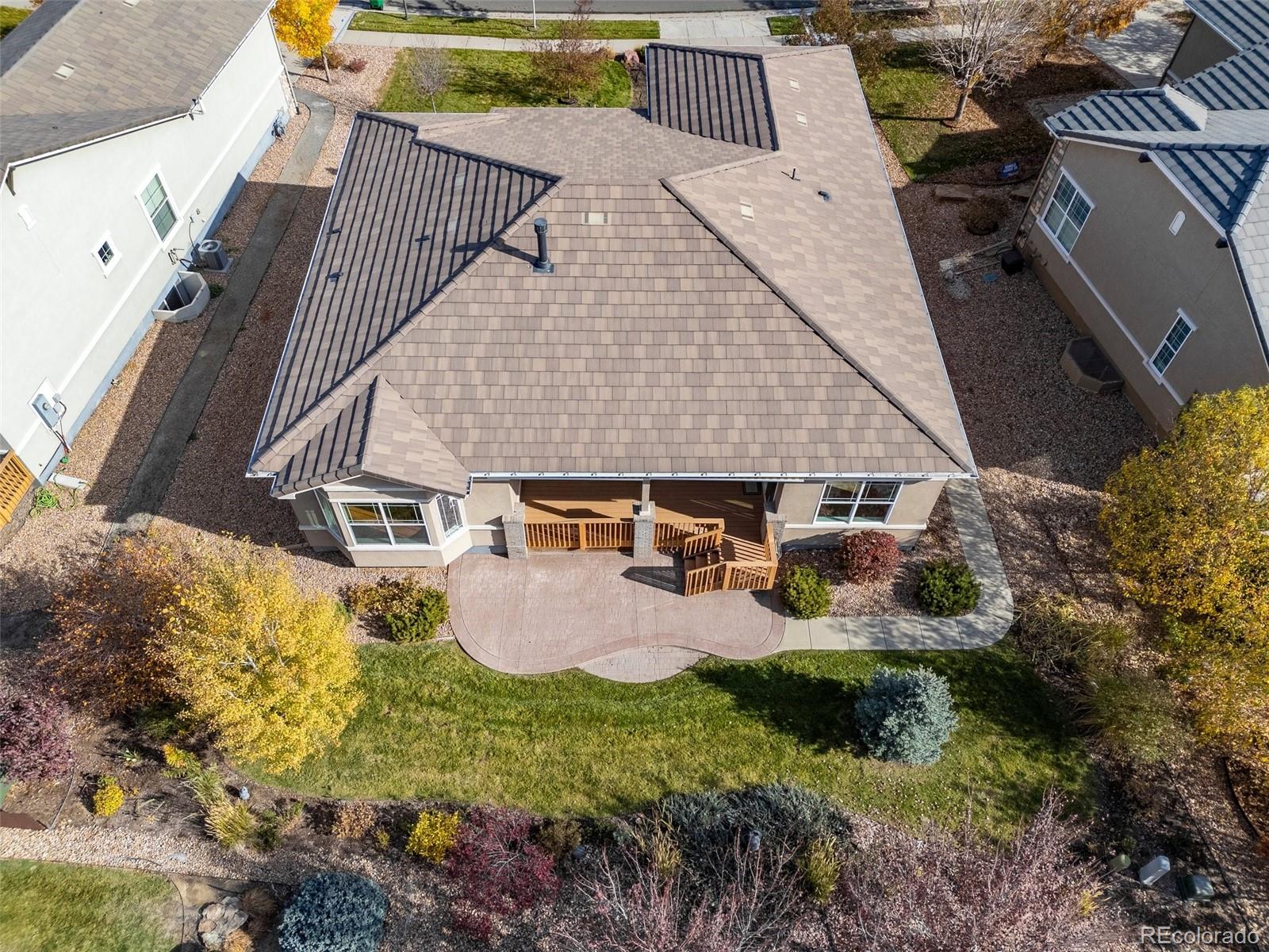 15965 Redcloud Way Broomfield, CO 80023 - Photo 34 of 49 an aerial view of a house with backyard and outdoor seating