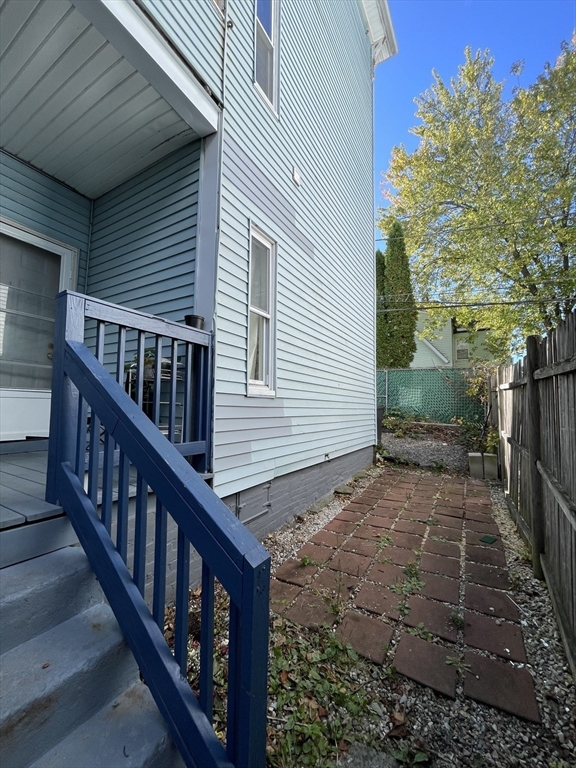 5 Freeland Terrace, Unit 1 Worcester, MA 01603 - Photo 6 of 16 a view of a house with backyard and deck