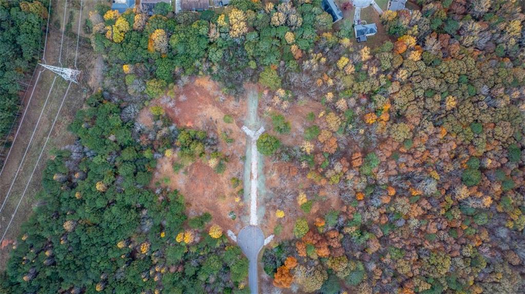 3 Shiloh Ridge Trail Snellville, GA 30039 - Photo 2 of 11 a backyard of a house with lots of green space