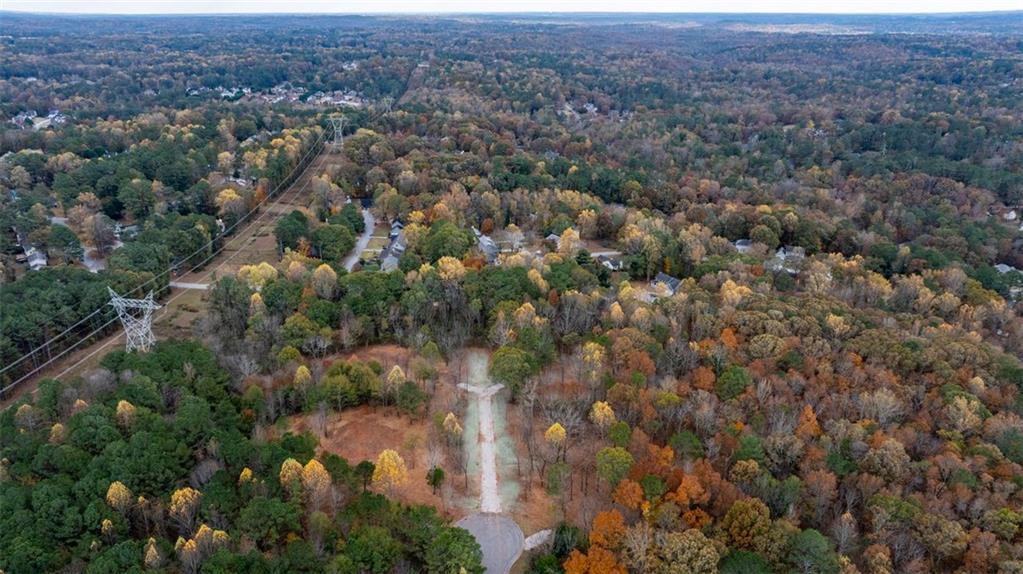 3 Shiloh Ridge Trail Snellville, GA 30039 - Photo 3 of 11 an aerial view of residential houses with outdoor space and trees
