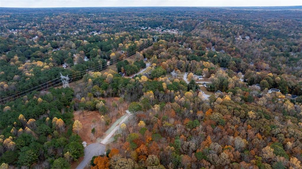3 Shiloh Ridge Trail Snellville, GA 30039 - Photo 4 of 11 an aerial view of residential houses with outdoor space and trees