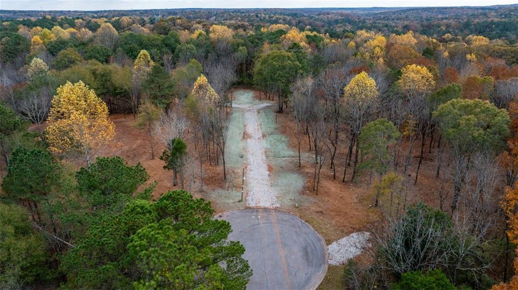 3 Shiloh Ridge Trail Snellville, GA 30039 - Photo 7 of 11 an aerial view of residential house with outdoor space and lake view
