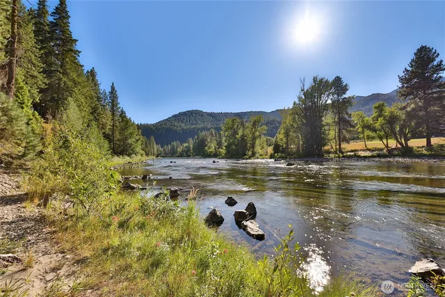 a view of a lake with mountain
