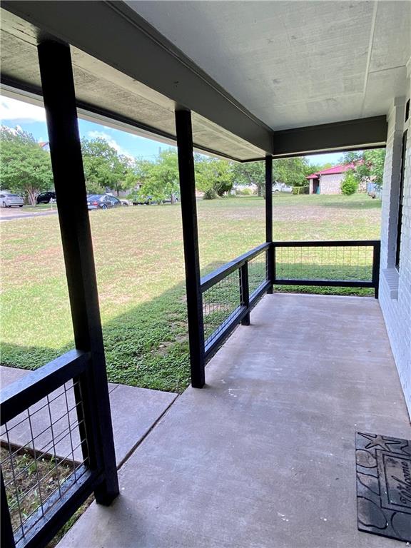 1715 Shadowview Drive, Unit B Austin, TX 78758 - Photo 5 of 28 A deep covered porch provides a pleasant transition from the lush yard to the home's entry.
