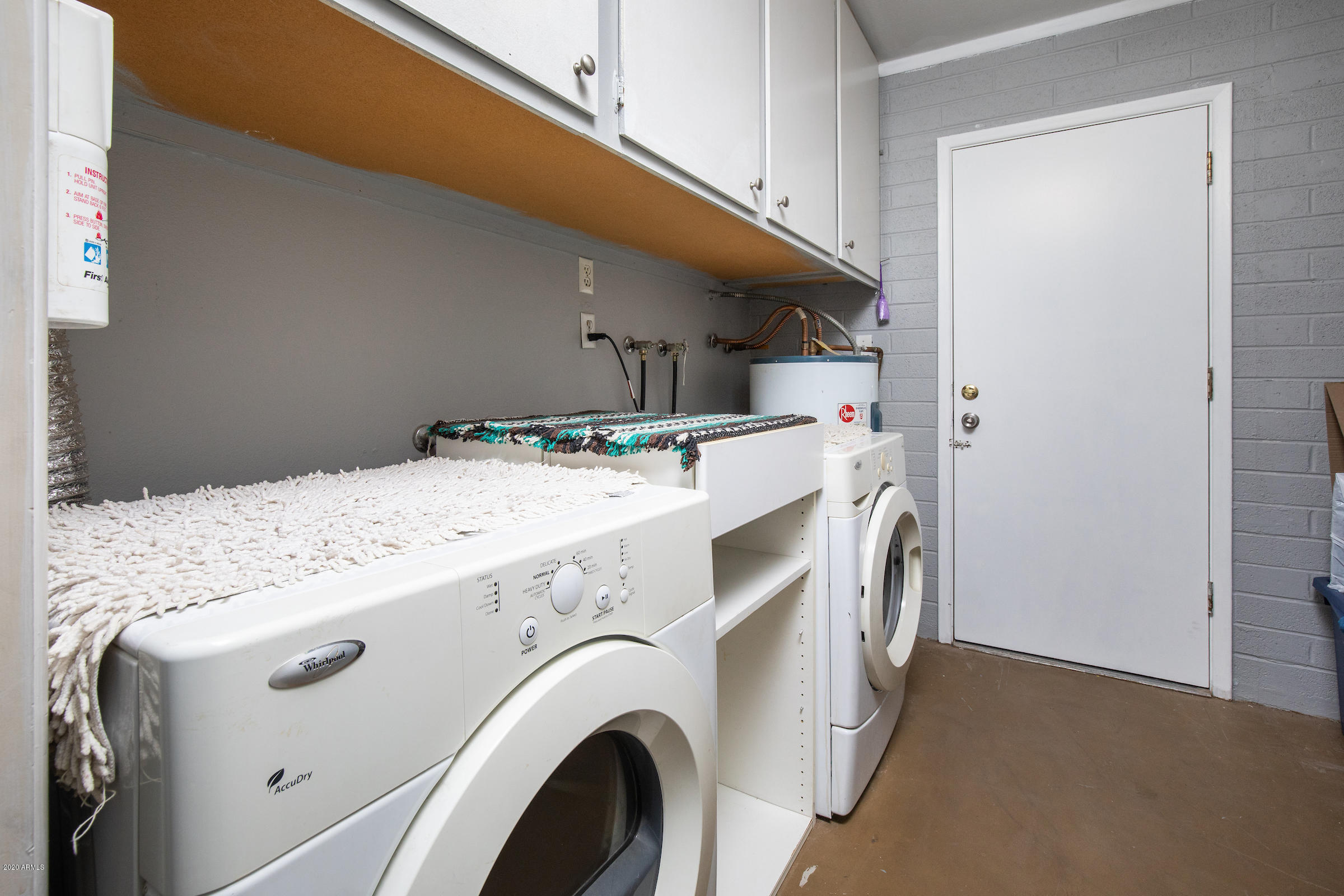 5320 East Decatur Street Mesa, AZ 85205 - Photo 22 of 34 a utility room with dryer and washer