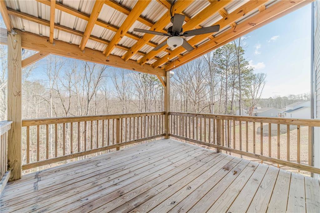1548 Ridgewood Court Monroe, GA 30656 - Photo 20 of 63 a view of porch with wooden floor